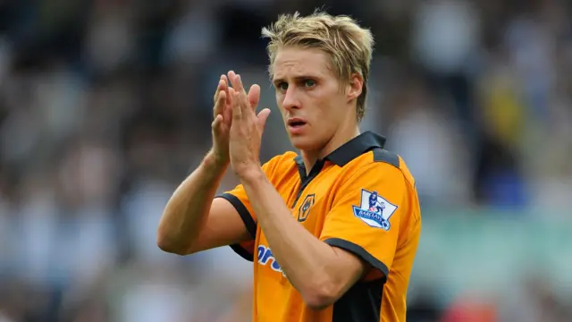 Dave Edwards applauds fans while playing for Wolves