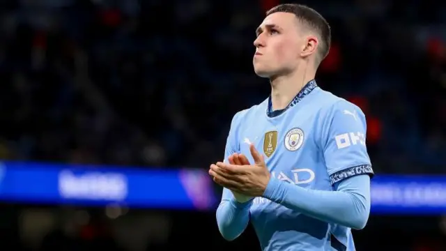 Phil Foden playing for Manchester City