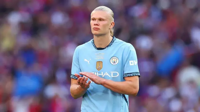 Erling Haaland applauds the fans at the end of the FA Cup final