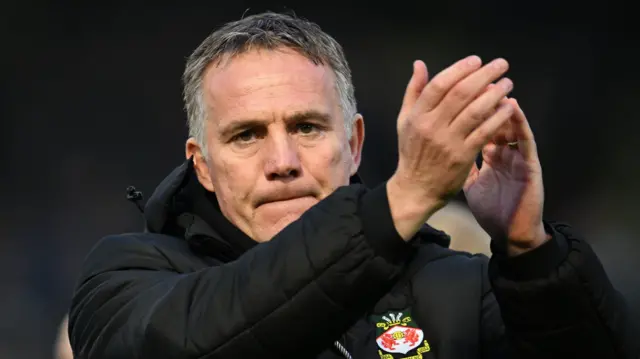 Phil Parkinson applauds Wrexham's fans at Harrogate