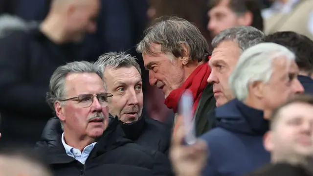Sir Jim Ratcliffe, owner of Ineos, co-owner of Manchester United speaks with Jason Wilcox