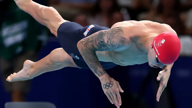 Matt Richards dives into the pool