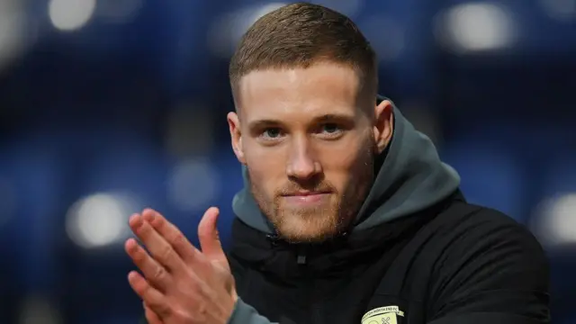 Preston North End defender Lewis Gibson is unveiled at Deepdale before their match against Oxford United