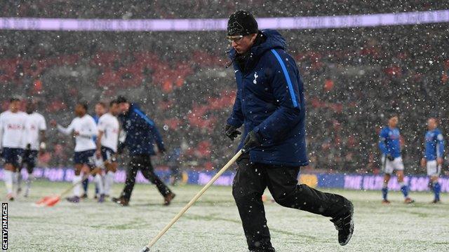 Ground staff cleared the pitch