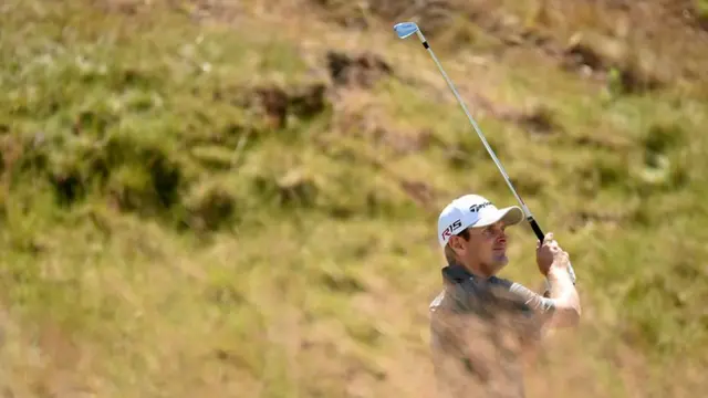 Justin Rose out on the course