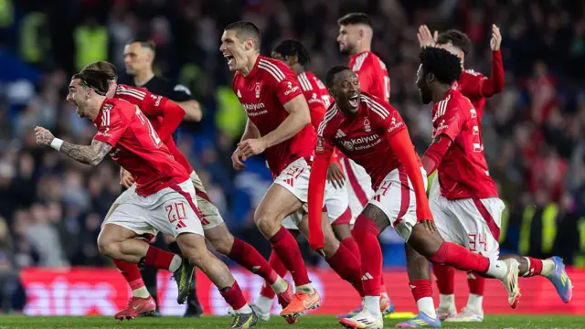 Nottingham Forest players celebrate together