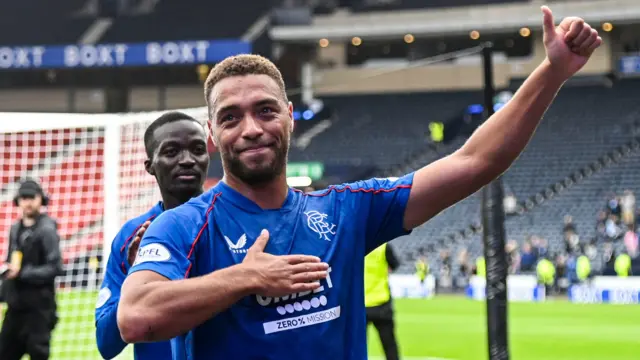 Rangers striker Cyriel Dessers celebrates with the fans at Hampden after beating St Johnstone