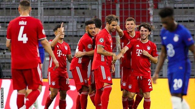 Bayern Munich's players celebrate scoring against Chelsea in the Champions League