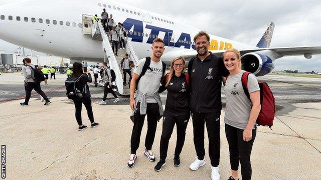 Liverpool Women manager Vicky Jepson (left centre), is joined by men's captain Jordan Henderson (left), men's manager Jurgen Klopp (right centre) and women's captain Sophie Bradley-Auckland