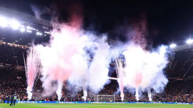 Fireworks and pyrotechnics are set off at Old Trafford before Europa League match