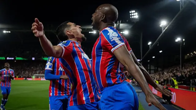 Jean-Philippe Mateta and Daniel Munoz celebrate