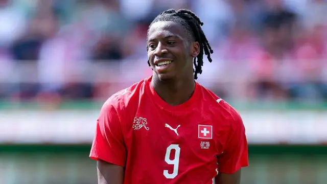 Johan Manzambi smiles while playing for Switzerland