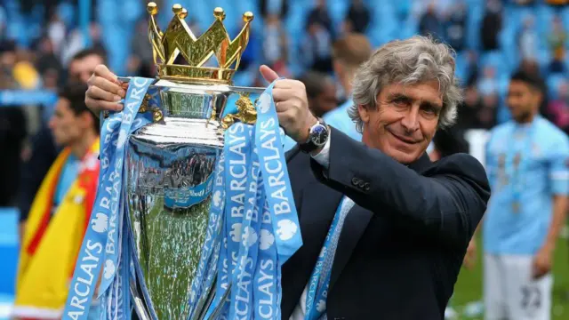 Manuel Pelligrini with the Premier League trophy