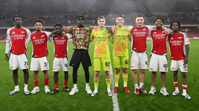 Arsenal academy players Ayden Heaven, Ethan Nwaneri, Ismeal Kabia, Khari Ranson, Jack Porter, Alexei Rojas, Maldini Kacurri, Myles Lewis-Skelly and Josh Nichols pose for a picture 