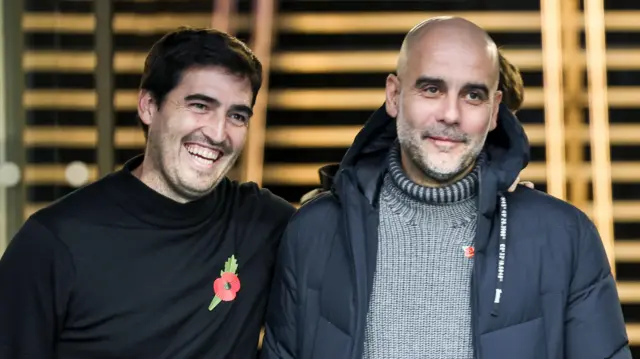 Andoni Iraola and Pep Guardiola walk out of a tunnel before a Premier League game