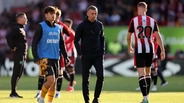 Gary O'Neil looking dejected after the loss at Brentford