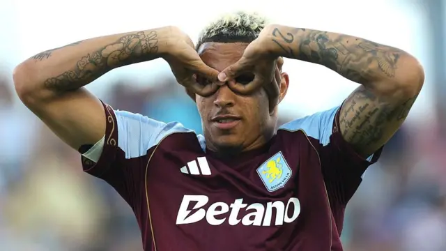 Morgan Rogers celebrates by putting his fingers over his eyes