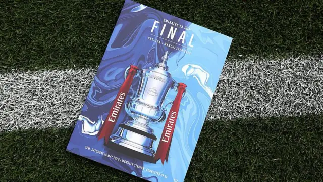 Man City v Chelsea FA Cup final programme on the Wembley turf