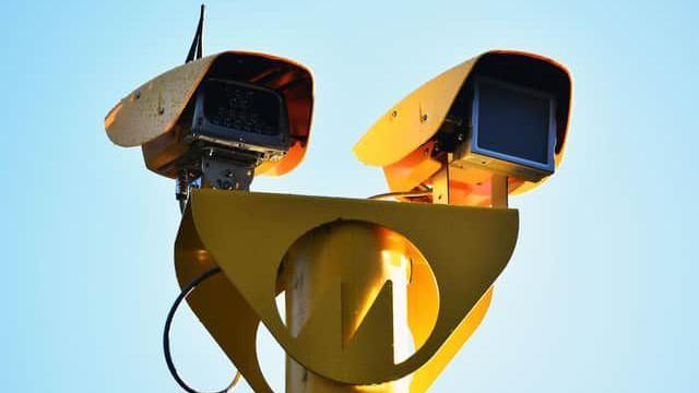 A yellow bi-directional speed camera