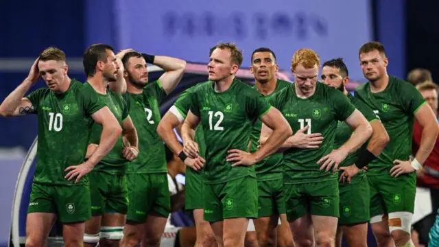 Ireland dejected after losing a tight quarter-final to Fiji