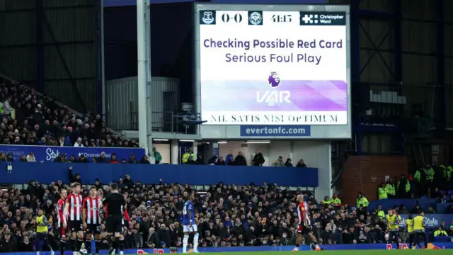 The VAR screen shows a possible red card check prior to the sending off of Christian Norgaard of Brentford