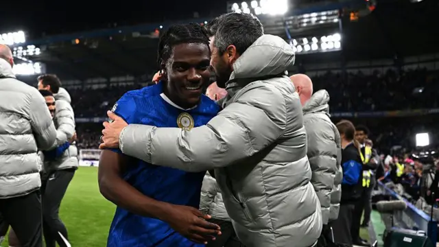 Romeo Lavia of Chelsea celebrates victory with Chelsea coaches