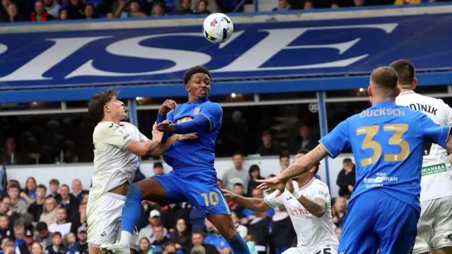 Birmingham City's Demarai Gray winning a header during their match against Swansea