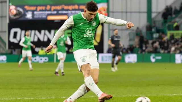 Hibernian’s Nectar Triantis scores to make it 2-0 during a William Hill Premiership match between Hibernian and Motherwell at the Easter Road Stadium