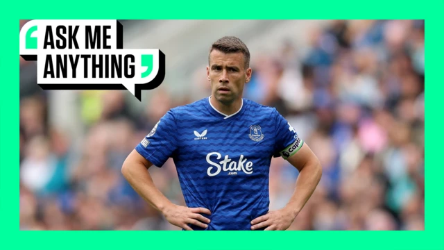 Seamus Coleman looks on for Everton with hands on hips and surrounded by mint green Ask Me Anything branding border