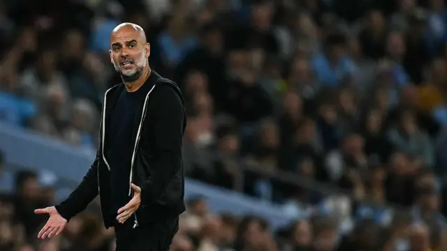 Pep Guardiola reacts during the game