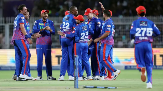 Delhi Capitals players celebrate a wicket