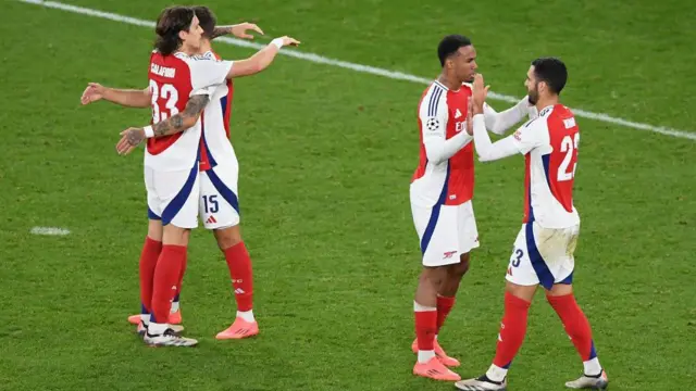 Riccardo Calafiori, Jakub Kiwior, Gabriel and Mikel Merino of Arsenal celebrate at full-time