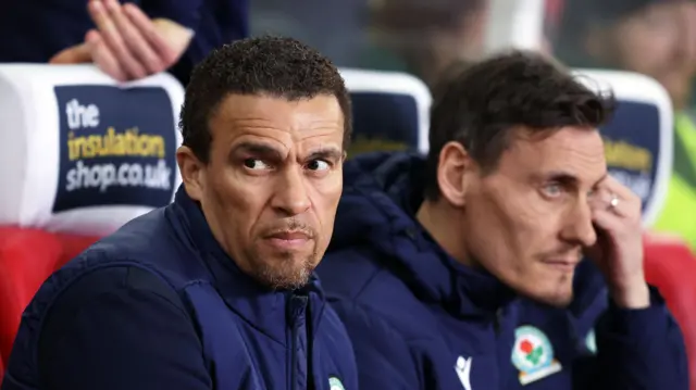 Valerien Ismael in the dugout in the foreground with assistant Dean Whitehead in the background