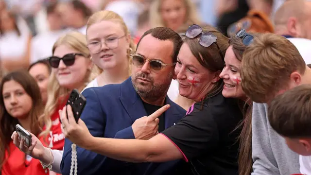 Danny Dyer takes a selfie with a fan during Soccer Aid 2026