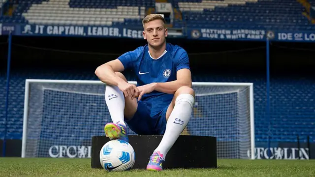 Liam Delap poses for a photo as Chelsea unveil him