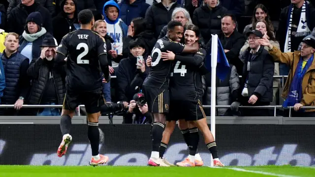 Fulham players celebrate a goal