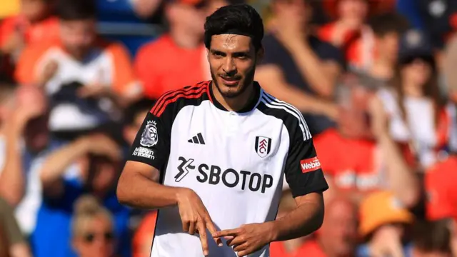  Raul Jimenez of Fulham celebrates scoring their third goal during the Premier League match between Luton Town and Fulham FC at Kenilworth Road on May 19, 2024