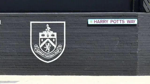 General view of Burnley badge outside Turf Moor