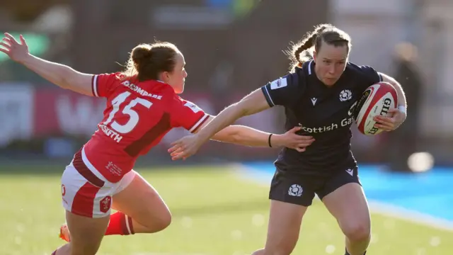 Coreen Grant scoring a try against Wales