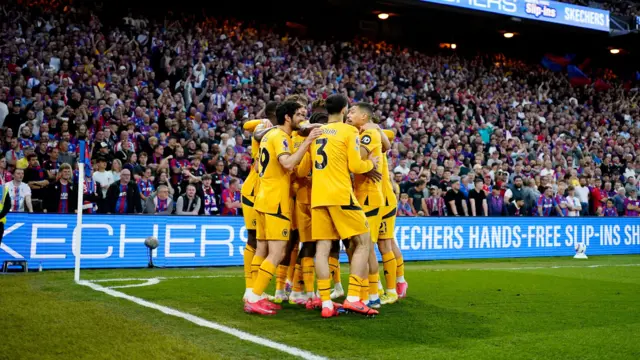 Wolves players celebrate a goal