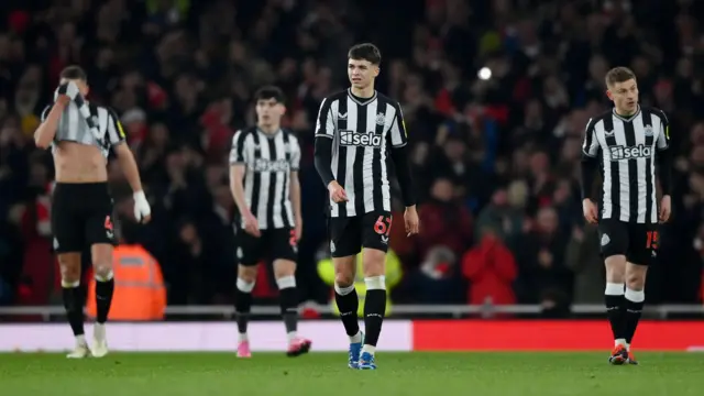 Dejected Newcastle players