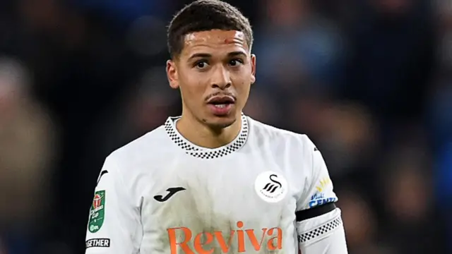 Manuel Benson leaves the field after a Swansea game 
