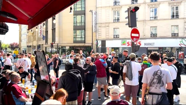 Aston Villa fans outside bar in Paris street