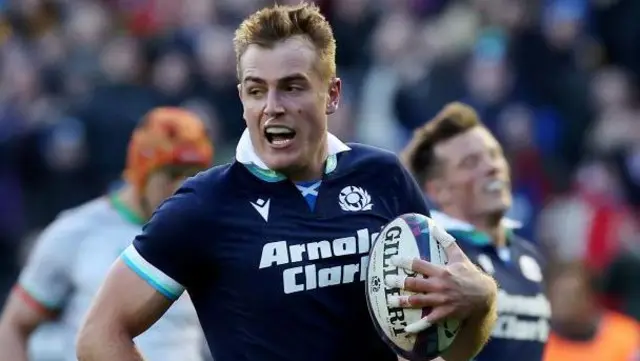 tafford McDowall of Scotland runs with the ball to score his team's second try during the Autumn Nations Series 2024 match between Scotland and Portugal at Scottish Gas Murrayfield 