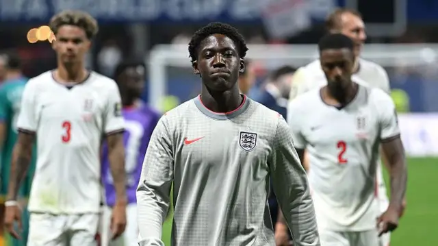 Kobbie Mainoo wearing an England training top