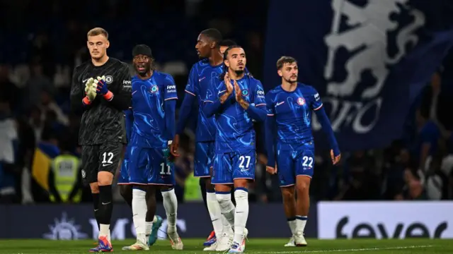 Chelsea players acknowledge the fans after victory over Servette at Stamford Bridge