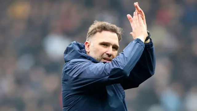 John Eustace claps the fans after Blackburn's defeat to Wolves in the FA Cup