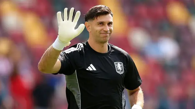 Emiliano Martinez of Aston Villa acknowledges the fans
