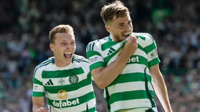 Celtic's Alistair Johnston and James Forrest celebrate