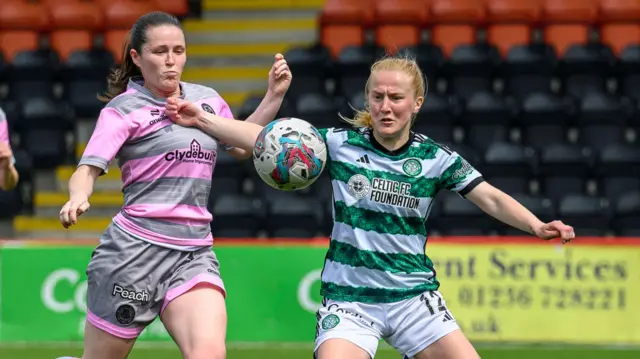 Partick Thistle's Linzi Taylor and Celtic's Murphy Agnew battle for the ball